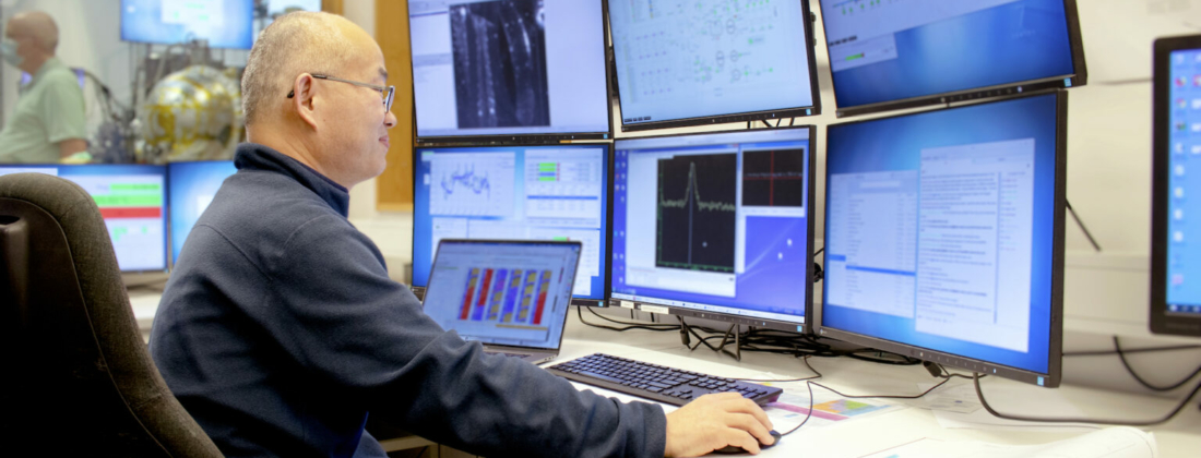 Xianjie Liu observing the data at HIPPIE beam line