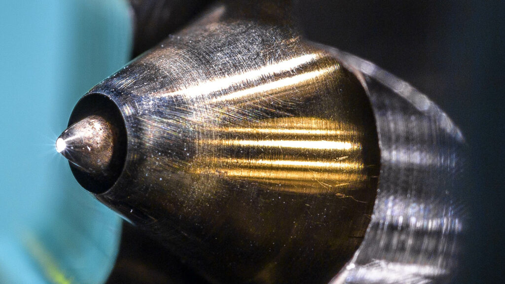 The head of a beamline with light shining at the end