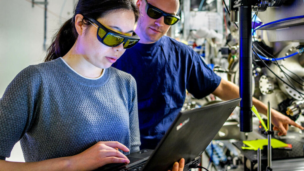 Two users with laser glasses inside the testing ring