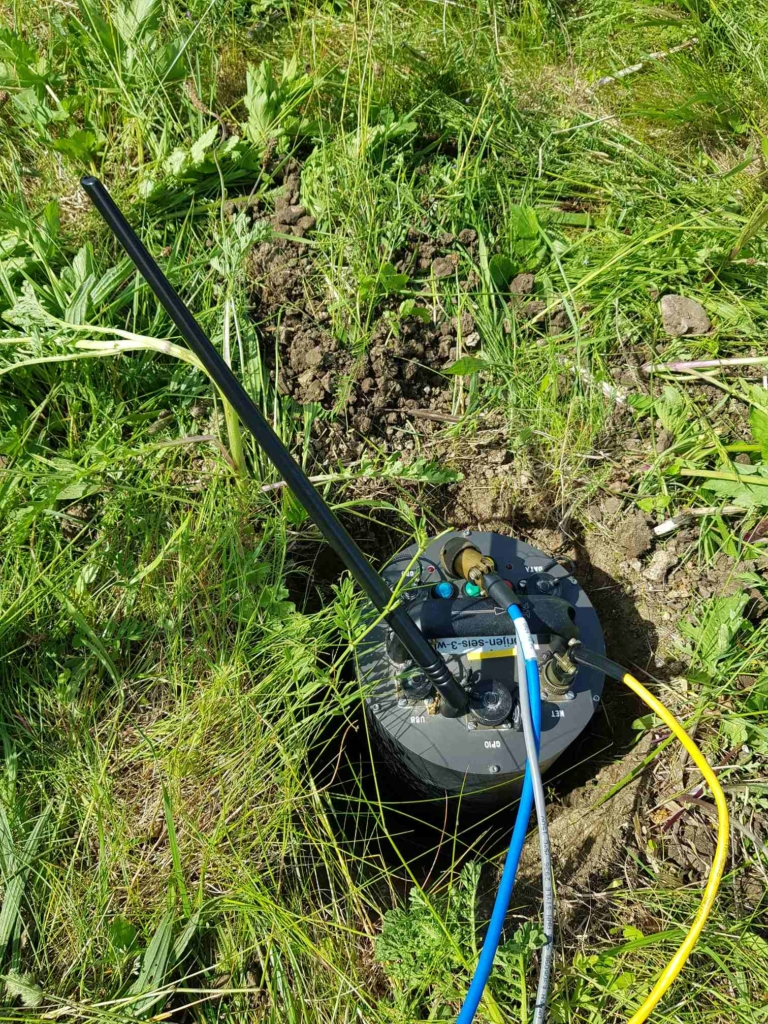 Seismometer buried in the ground