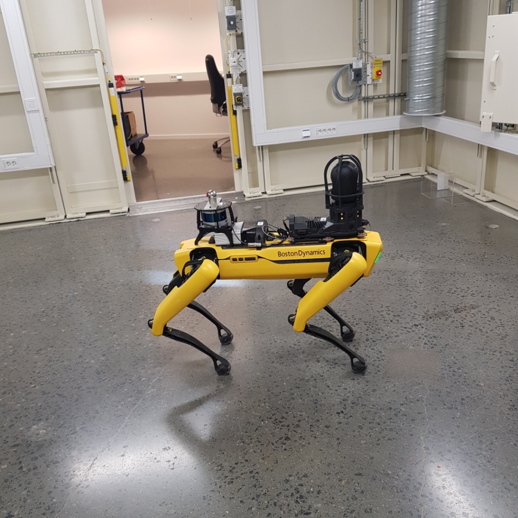 A robotic dog locates itself with external systems