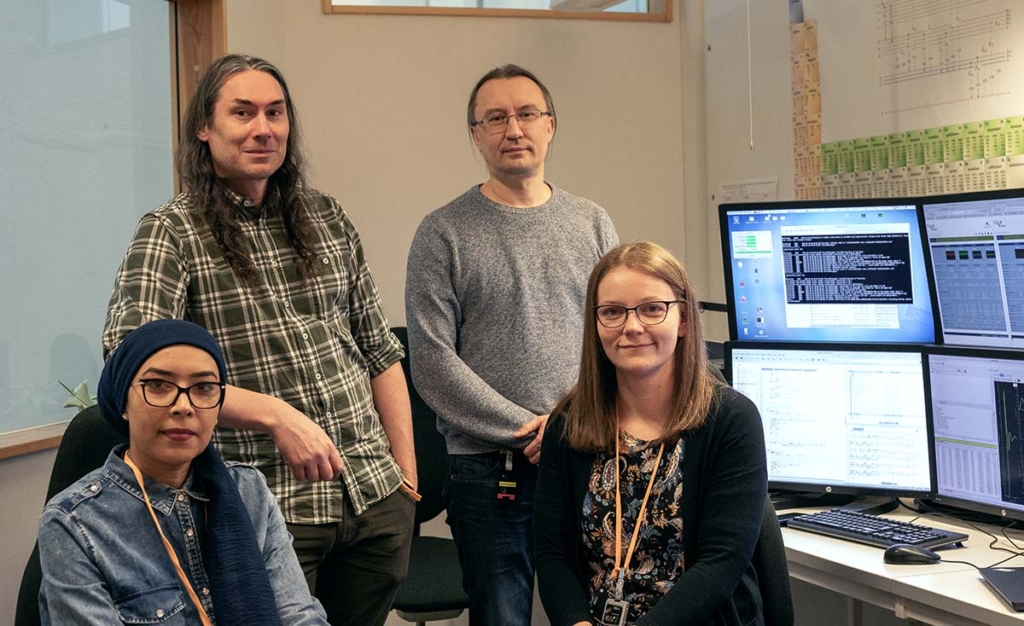 Team of researchers from Arevo in front of screens in control room at MAX IV.