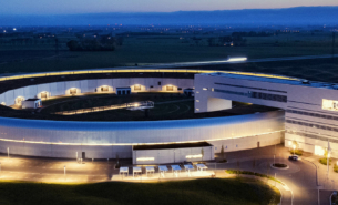 Dron image of the exterior of MAX IV at night.